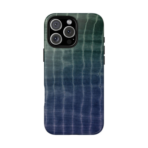 Ocean shibori tie-dye phone case with teal-to-blue swirls and camera cutouts