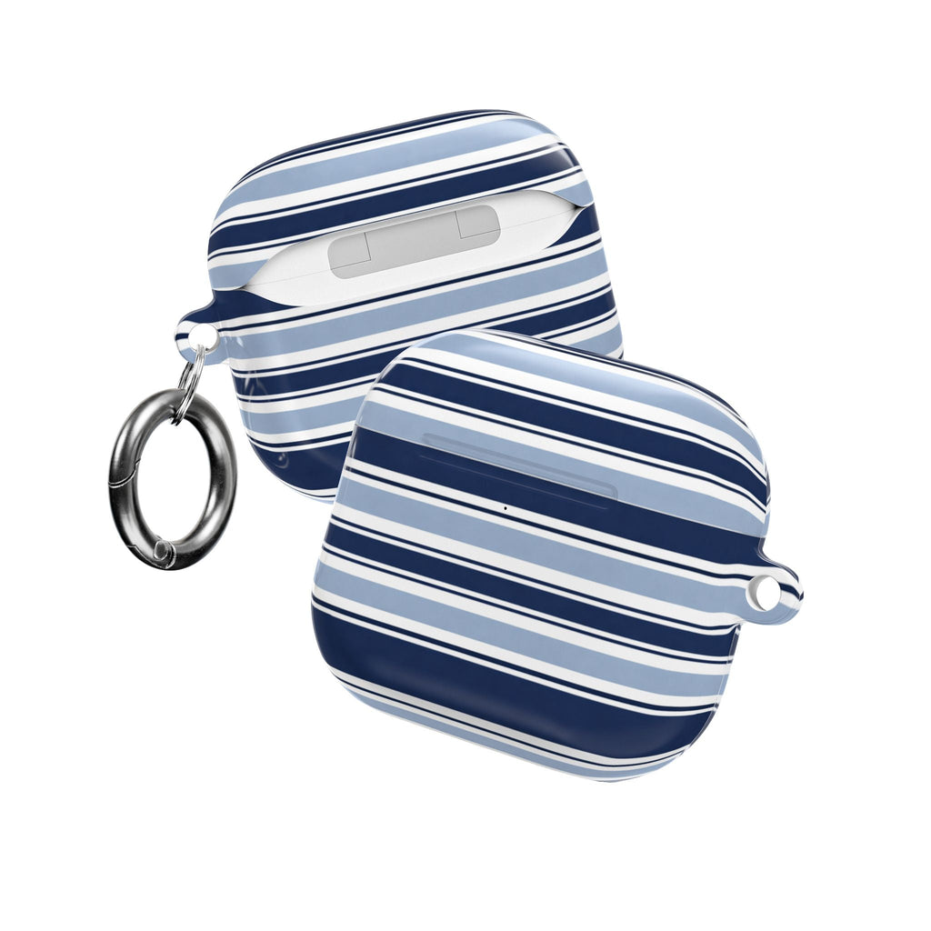 AirPod case with navy and light blue stripes, two hanging keyrings