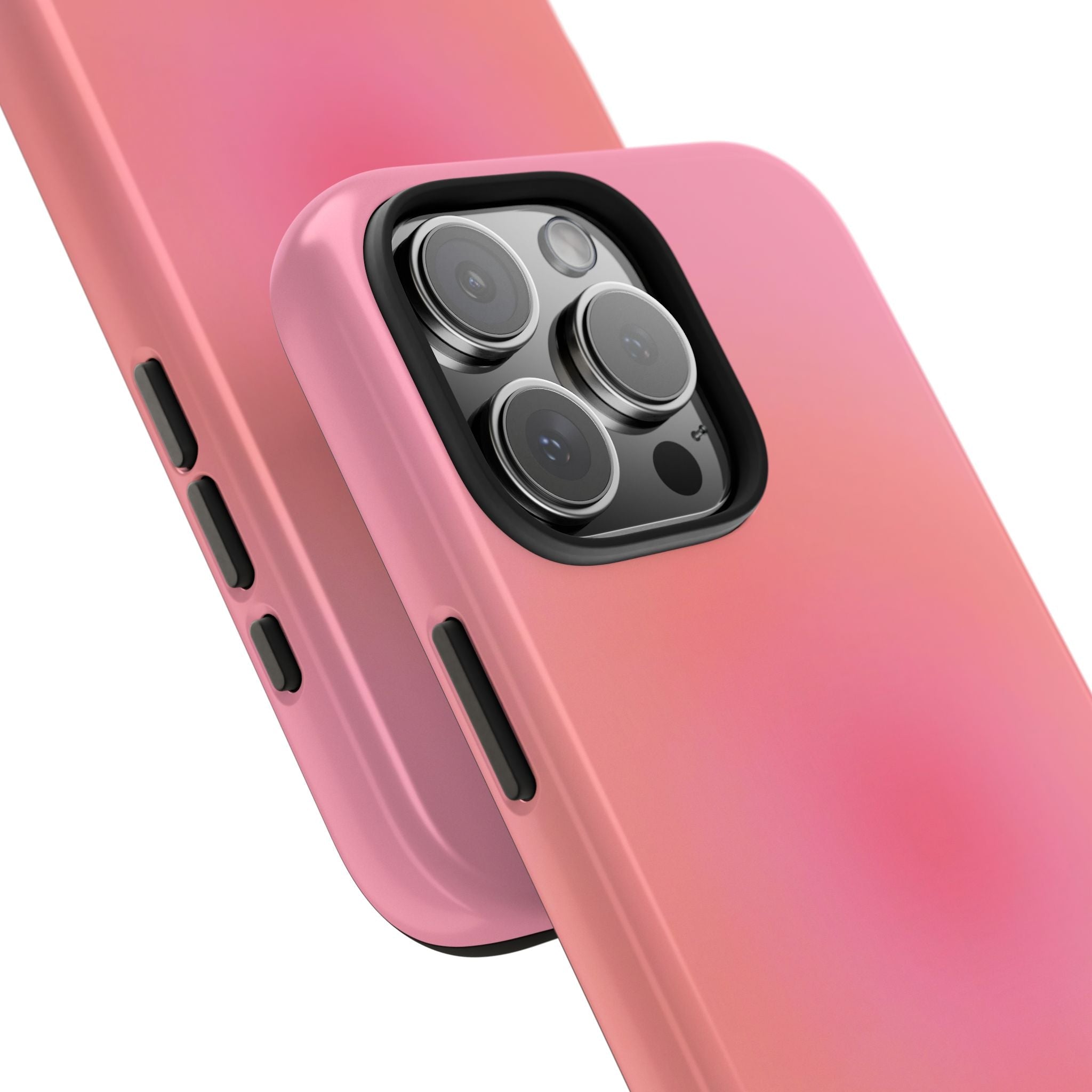 Close-up coral-pink aura case showing side button cutouts and raised triple-camera area