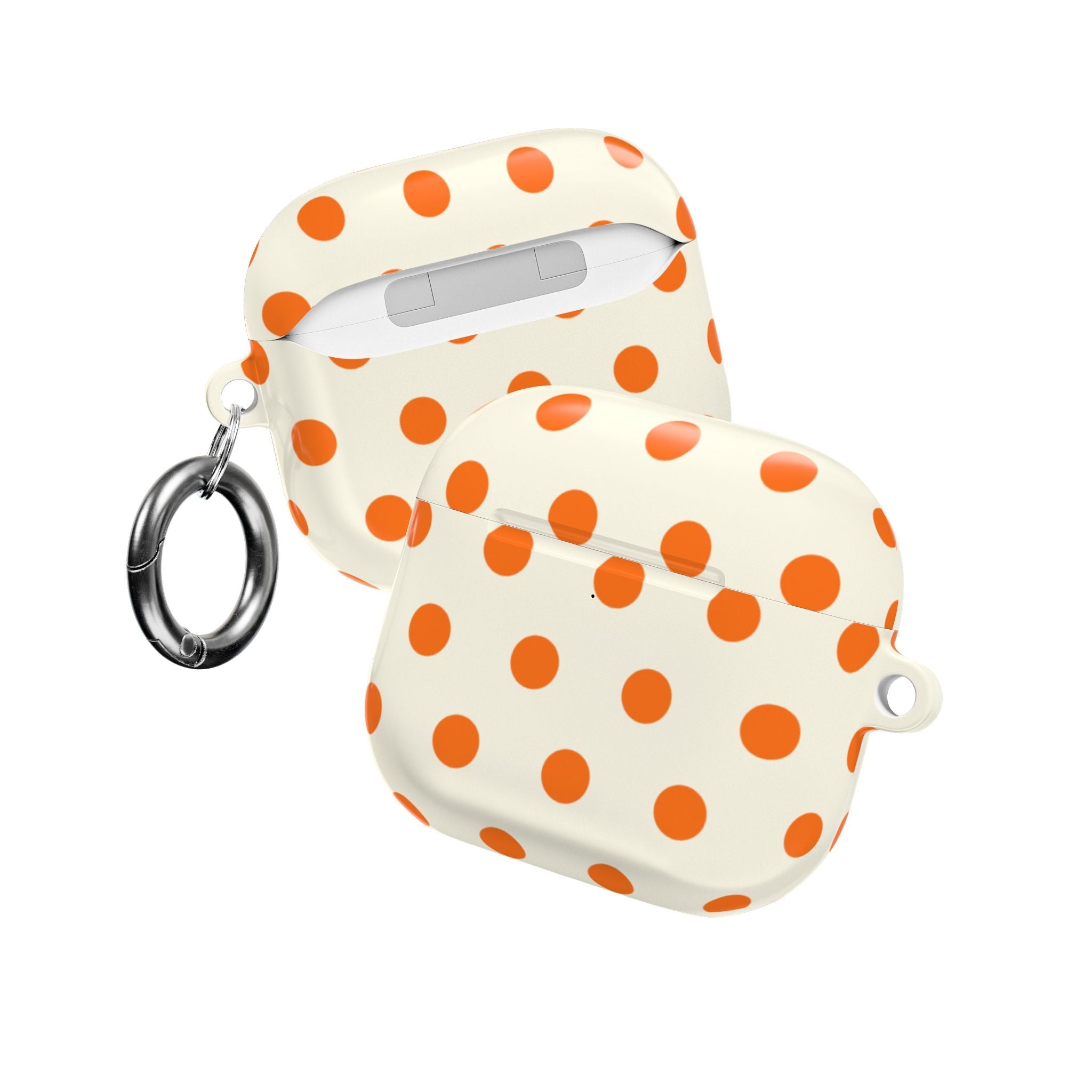Cream AirPods case with orange polka dots, open with both shells and key ring