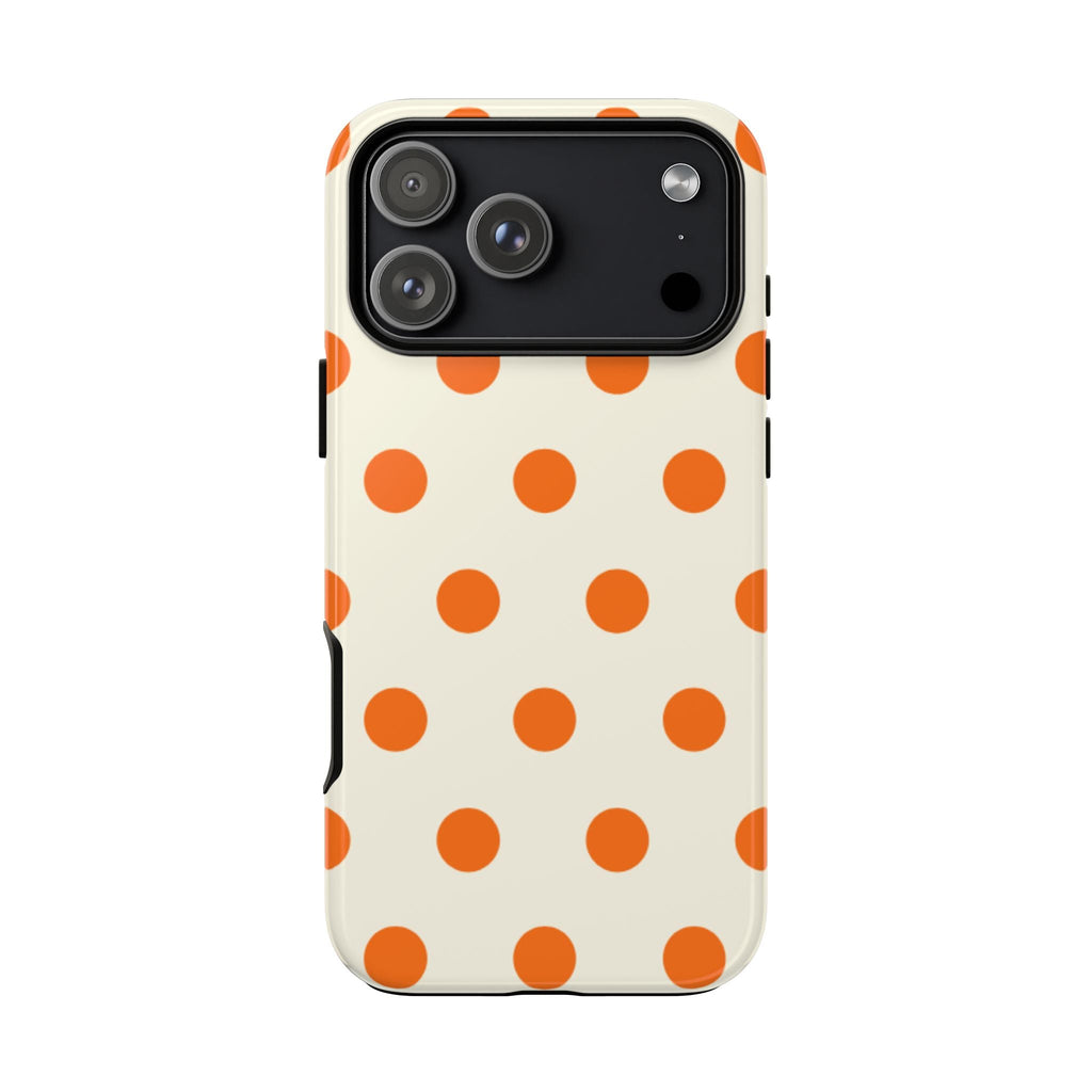 Cream phone case with orange polka dots pattern and raised camera area