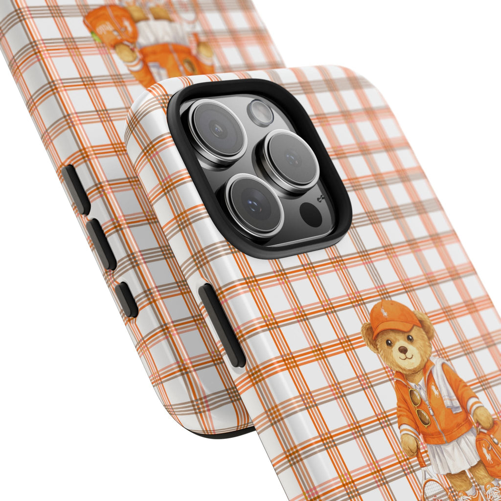 Orange gingham phone case with teddy bear tennis graphic; side buttons and camera