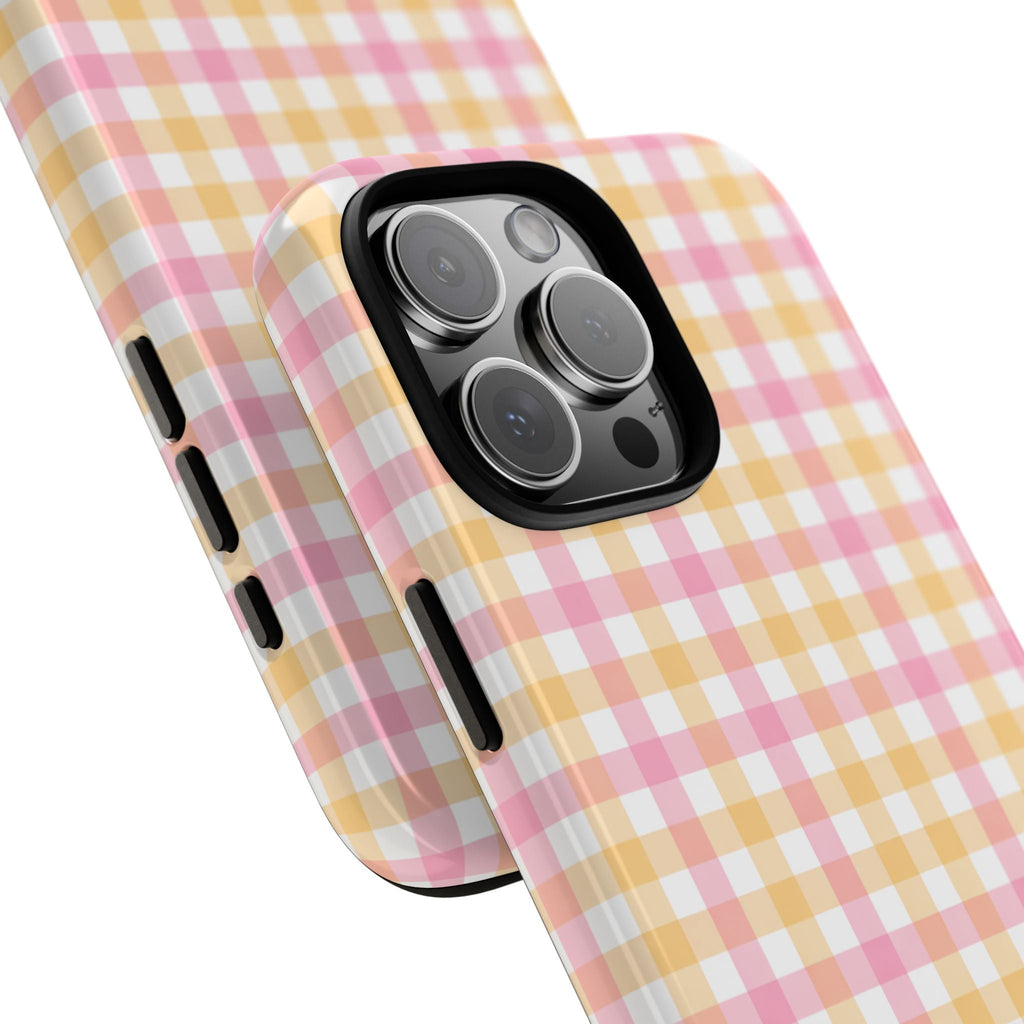 Orange and pink gingham phone case with side button cutouts and camera lenses