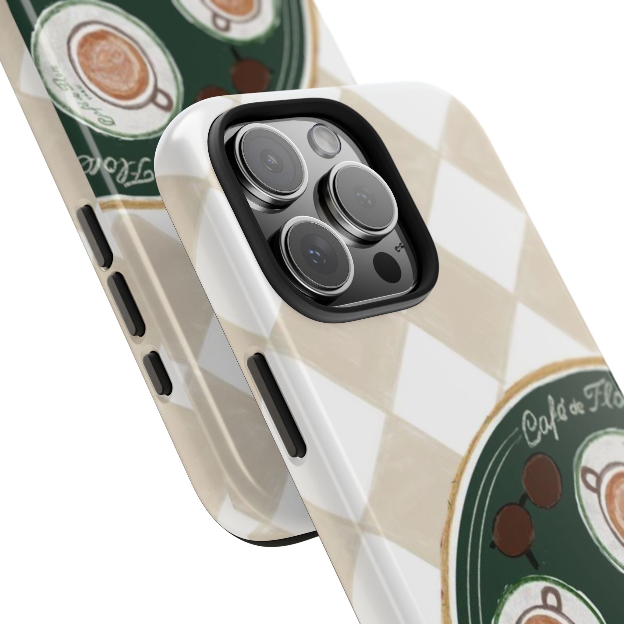 Phone case corner close-up: camera lenses over white diamond pattern and café artwork
