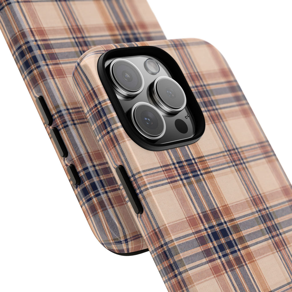 Parisian plaid phone case angled view, beige tan plaid with navy and rust; lens cutouts.