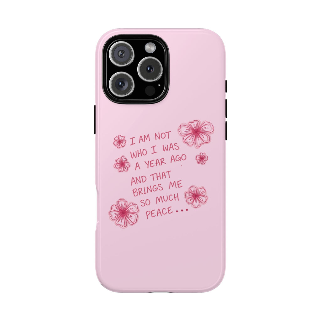 Pink phone case with floral quote and flowers, camera cutout