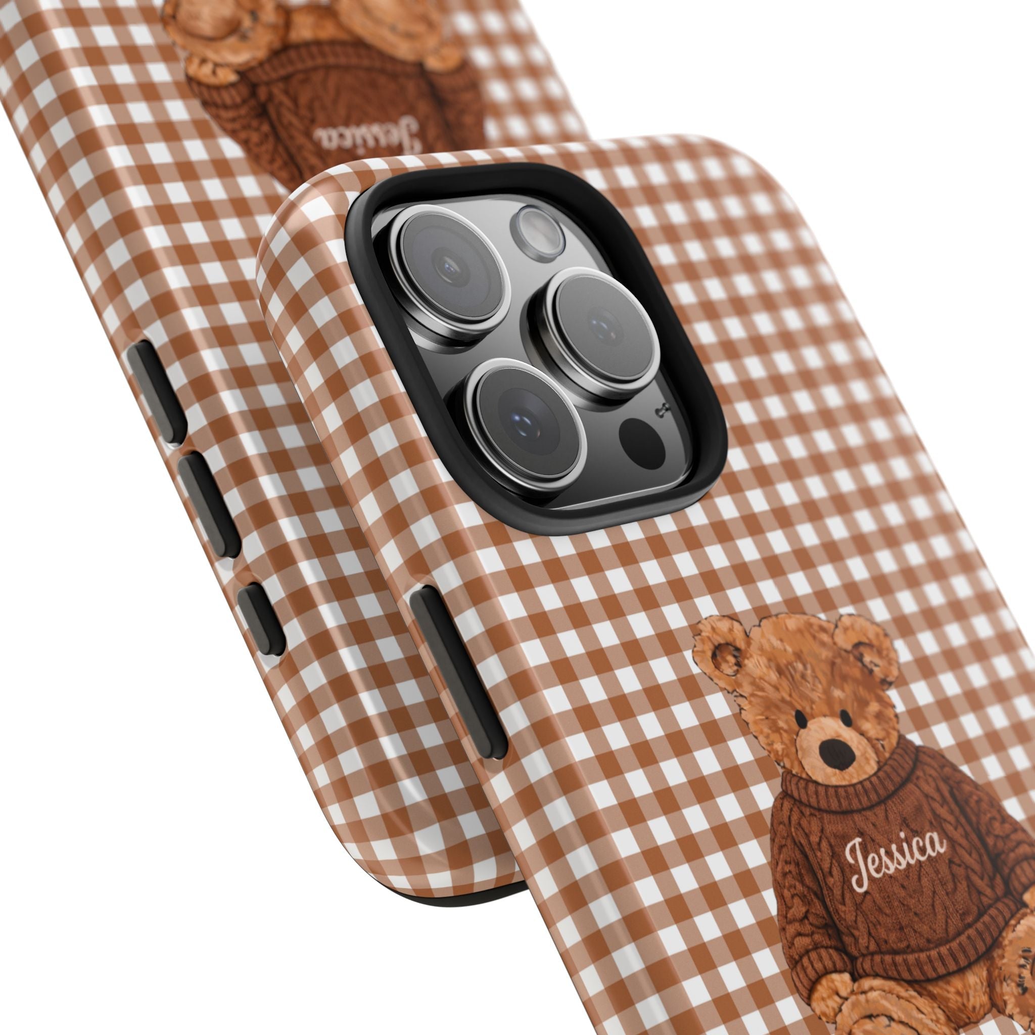 Brown gingham phone case with teddy bear graphic and “Jessica” name, corner close-up