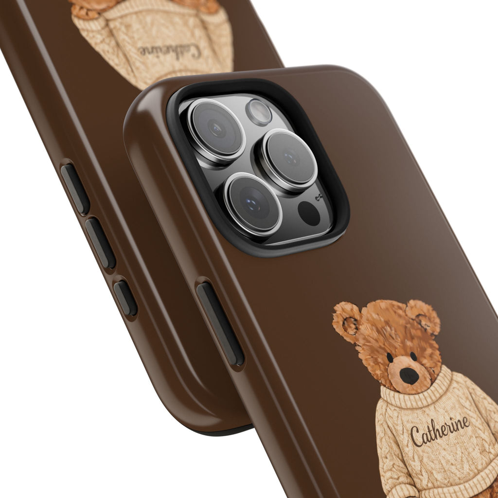 Brown teddy bear phone case angled close-up; Catherine print with camera lens cutouts