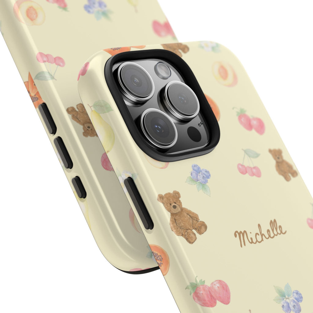Side view of personalized berry bears phone case with name Michelle, fruit and flowers