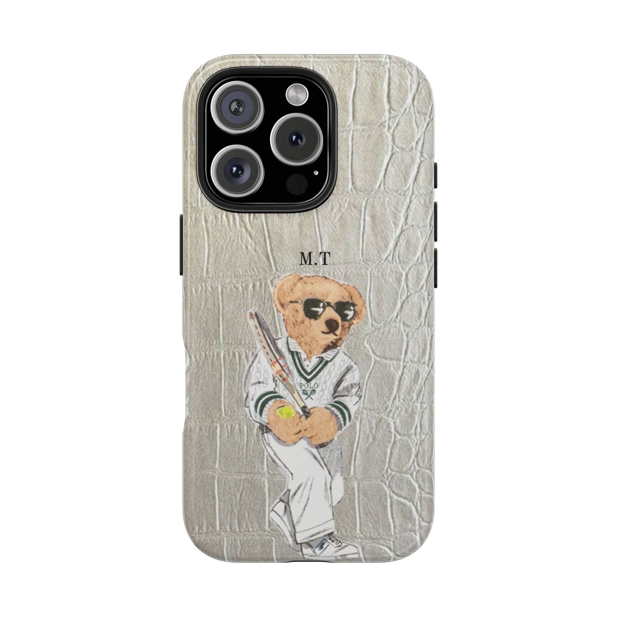 Beige crocodile-pattern phone case with teddy bear polo graphic and initials M.T.