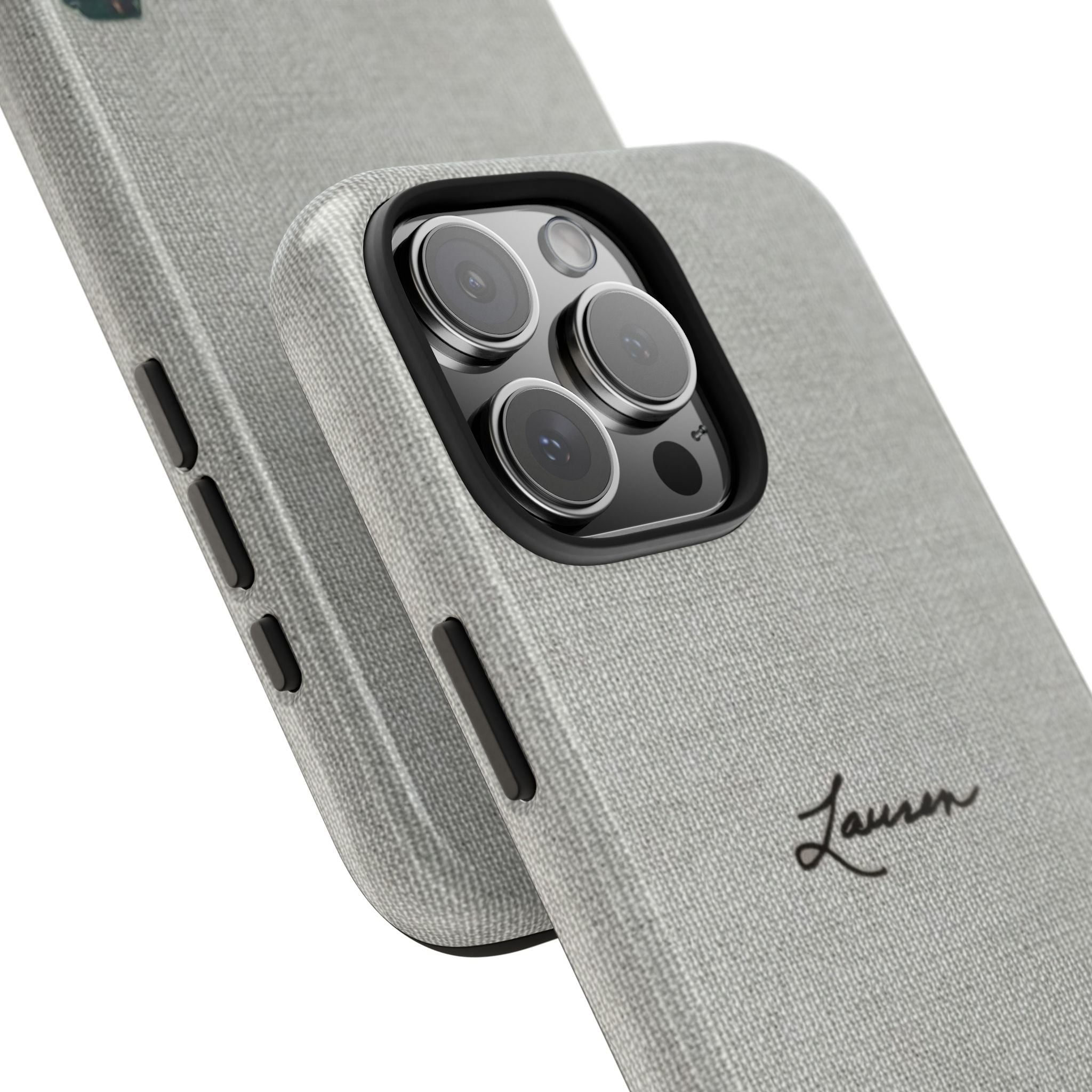 Gray textured phone case side view; cursive custom name near camera cutout