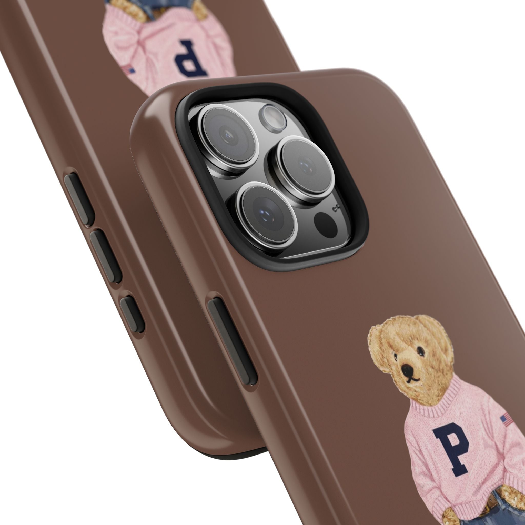 Brown phone case close-up: triple-camera cutout and teddy bear on front