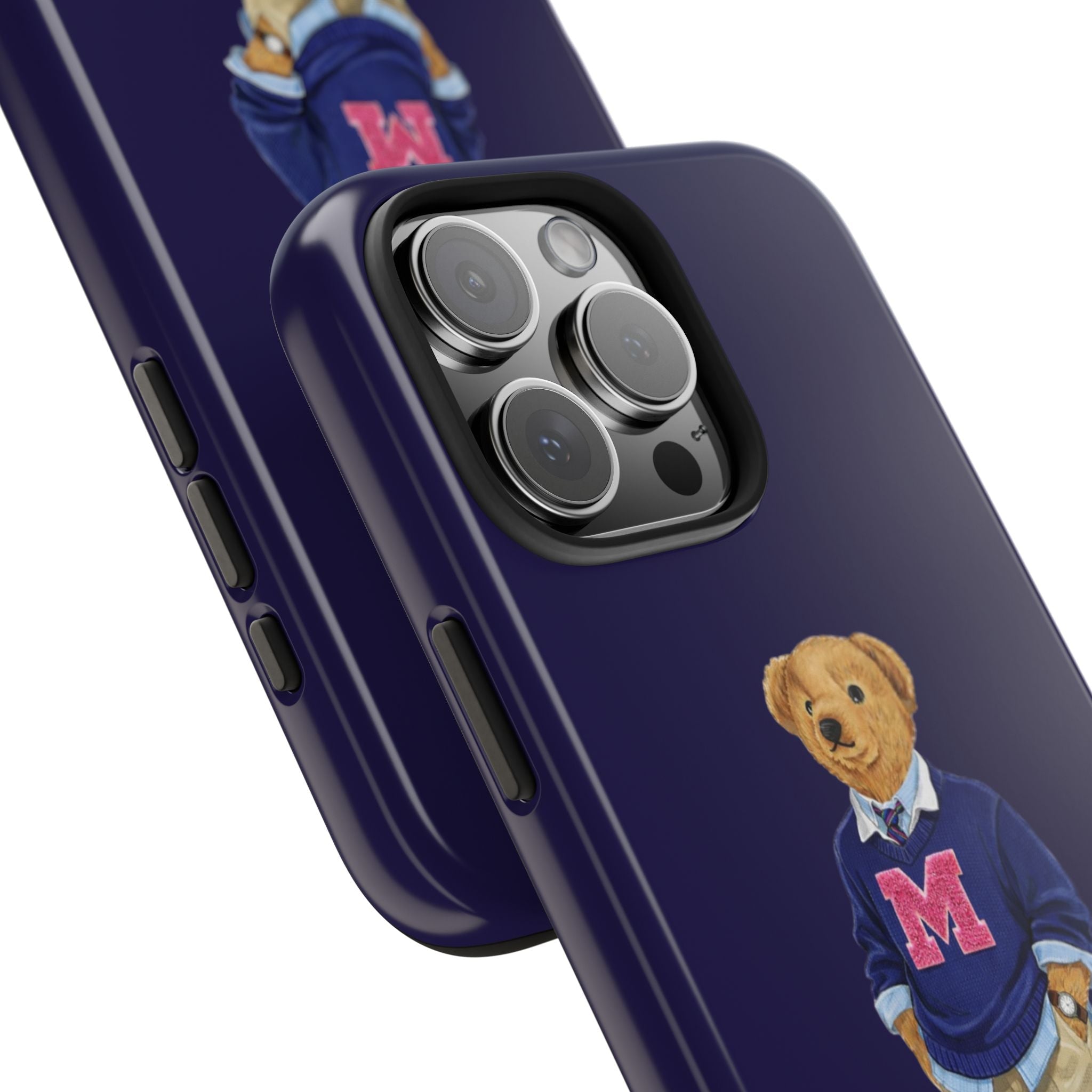 Diagonal view: navy phone case with teddy bear varsity sweater, red M letter