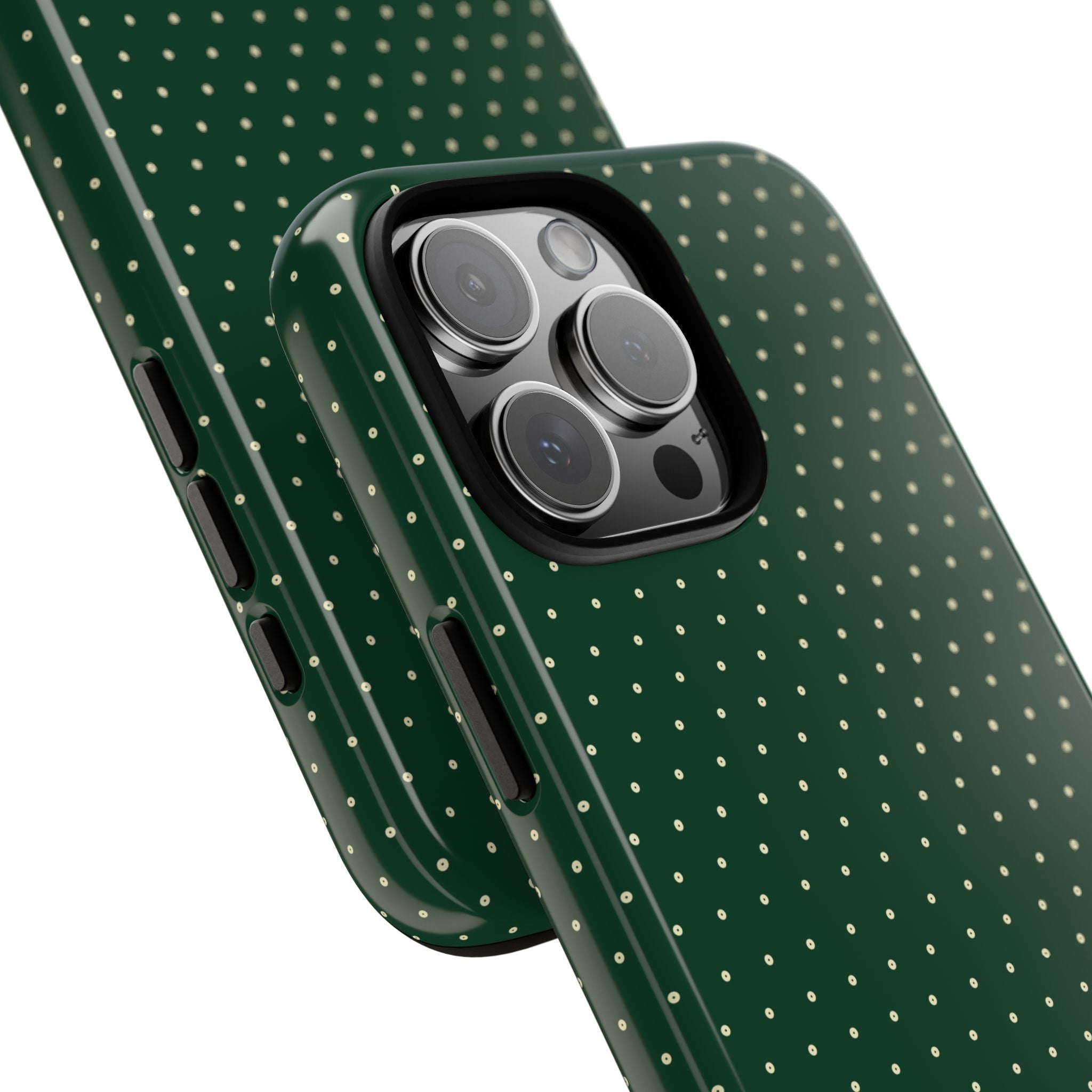 Green polka dot phone case corner showing side buttons and camera lens cutout