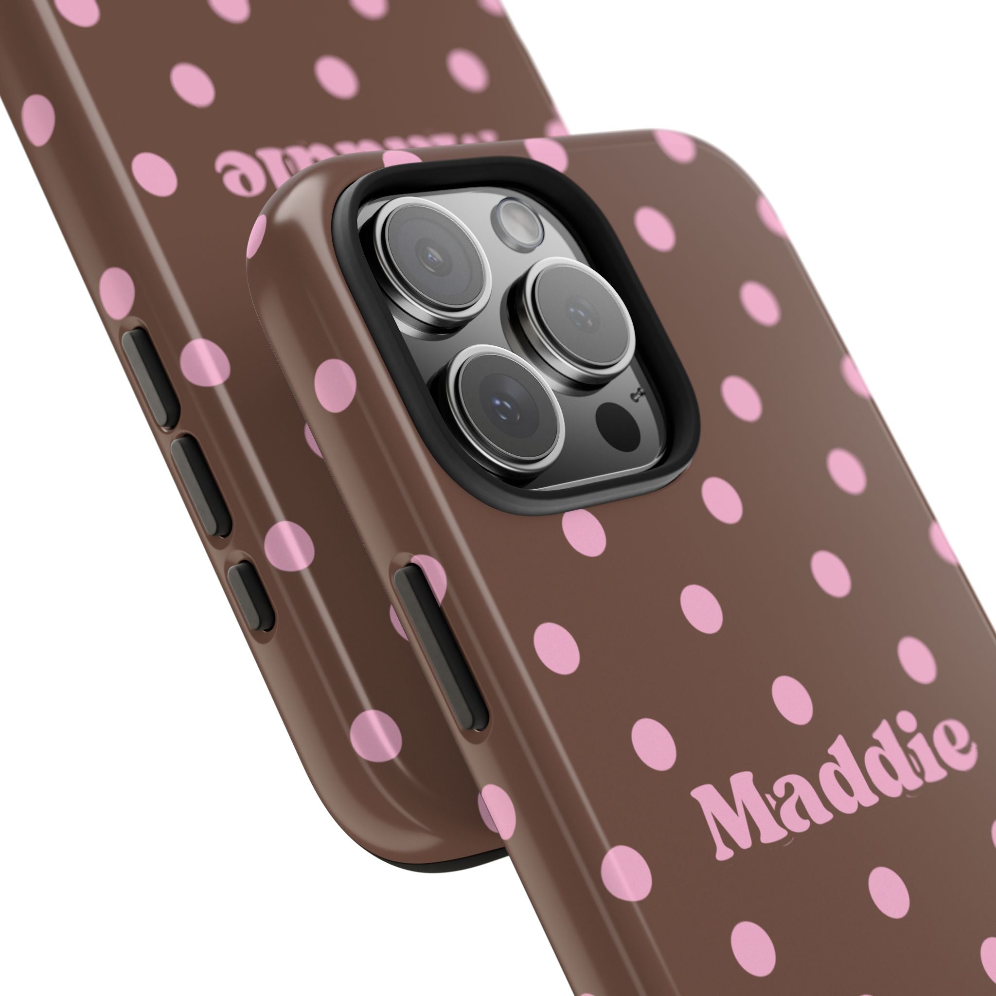 Brown case with pink polka dots, 'Maddie' text, and camera cutout (angled view)