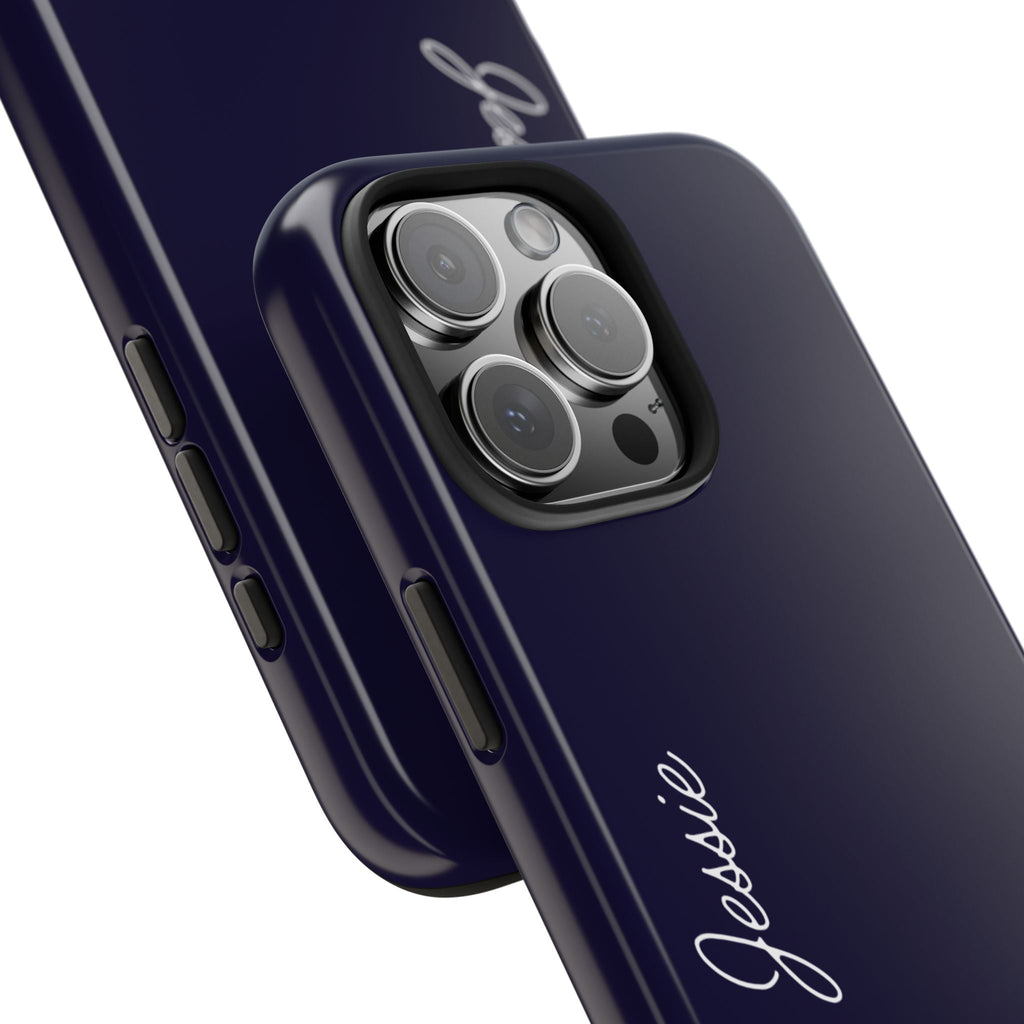 Navy phone case angled view with personalized name script and camera lens cutouts