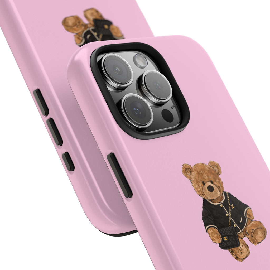 Pink phone case side view with teddy bear graphic and camera cutout detail