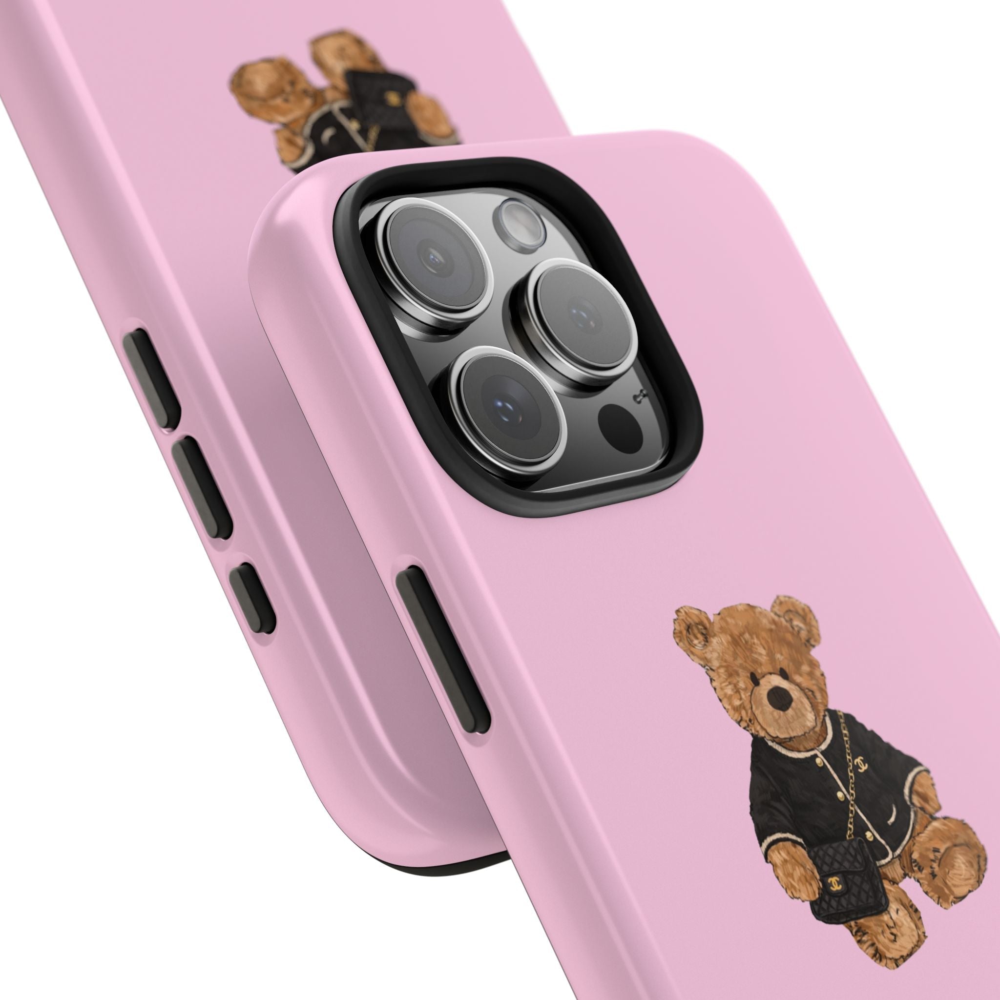 Pink phone case side view with teddy bear graphic and camera cutout detail