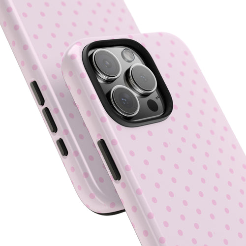 Pink polka dot phone case showing camera cutout and side button openings