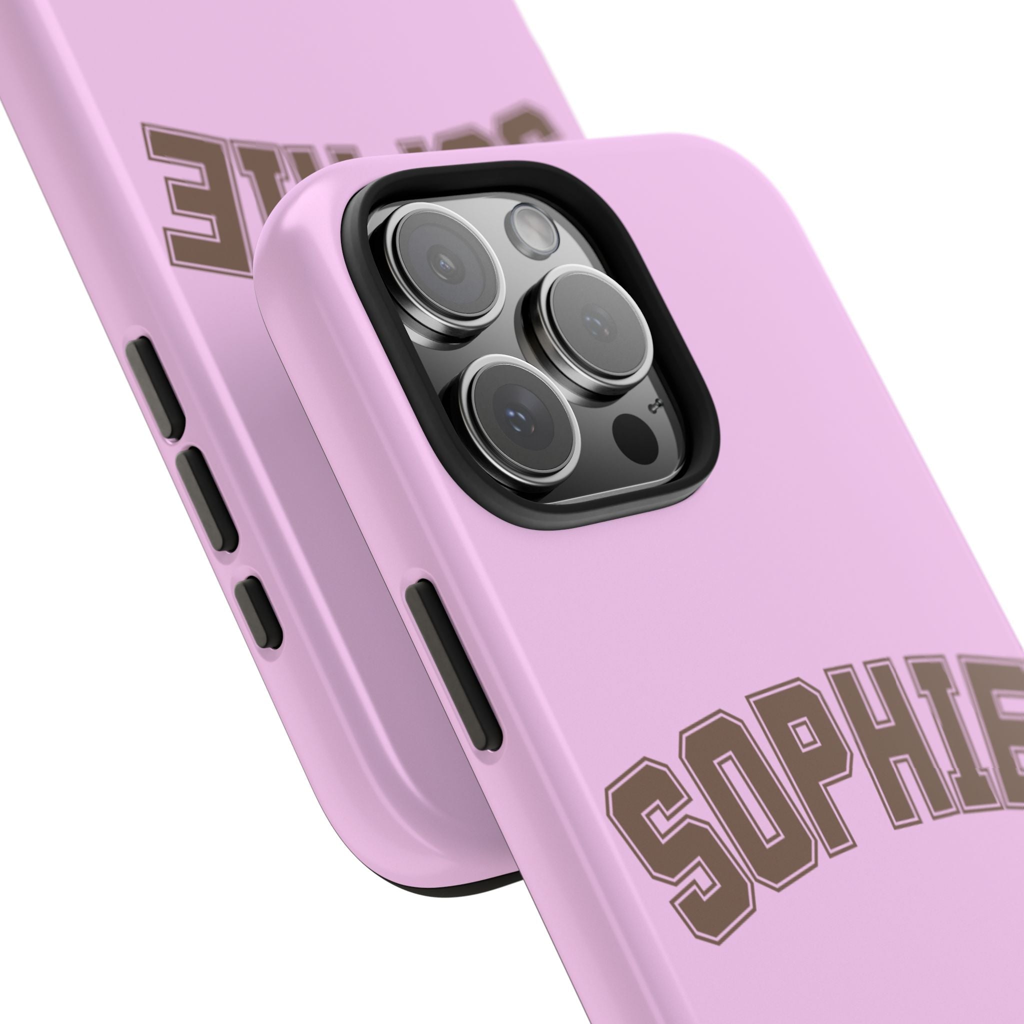 Close-up corner of pink phone case with SOPHIE print and camera lens openings