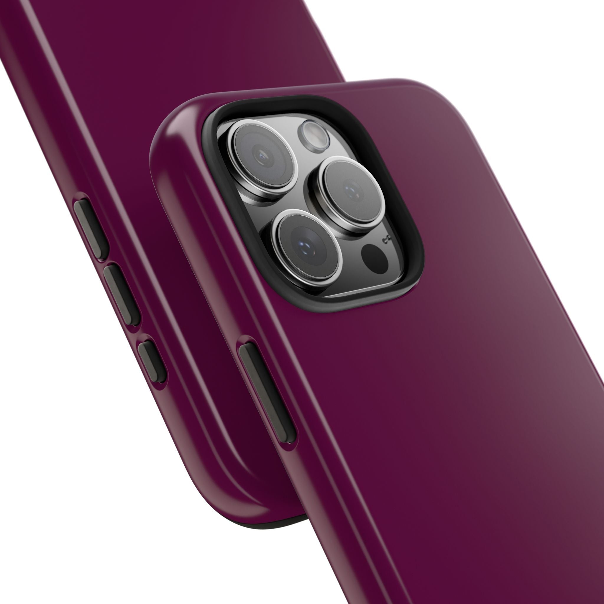 Plum phone case corner detail showing camera cutout and side buttons