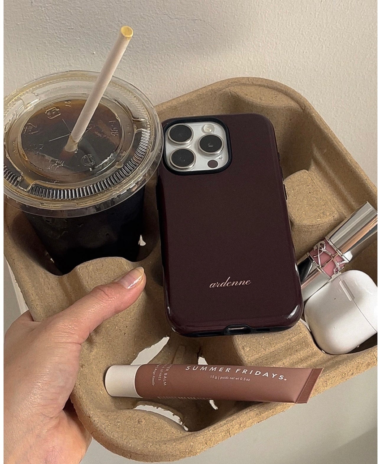 Personalized name phone case in dark plum, “ardenne” text on back