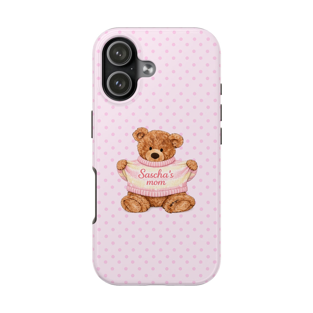 Pink polka-dot phone case with teddy bear in pink sweater, 'Sascha's mom' text.