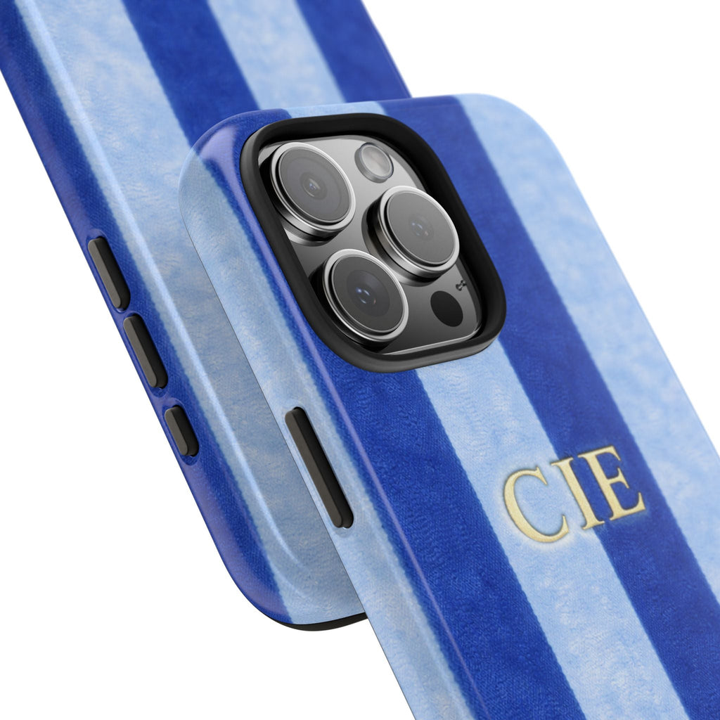 Blue velvet stripe phone case with gold 'CIE' initials and raised camera bump