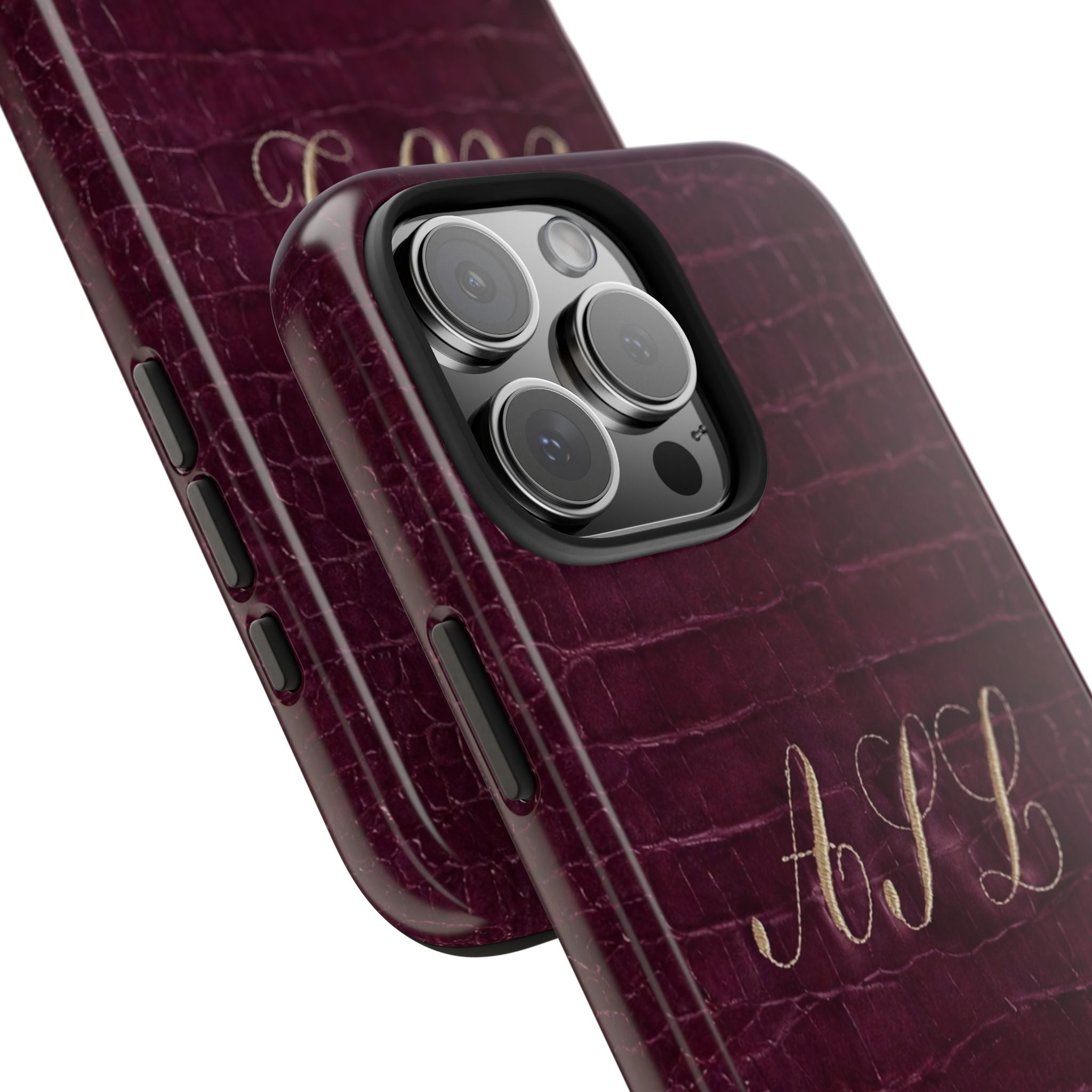 Side view plum croc phone case with custom initials and raised camera lens area