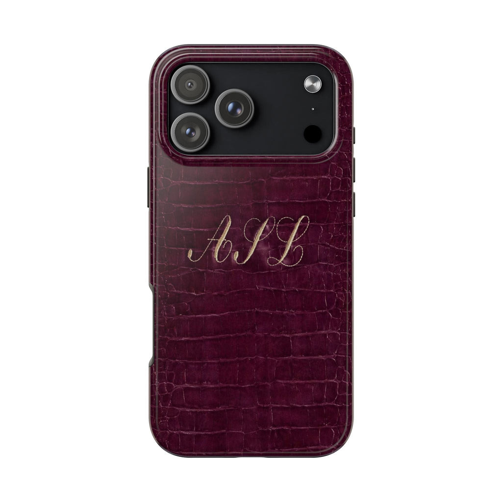 Plum croc-embossed phone case with custom initials print, camera cutouts visible