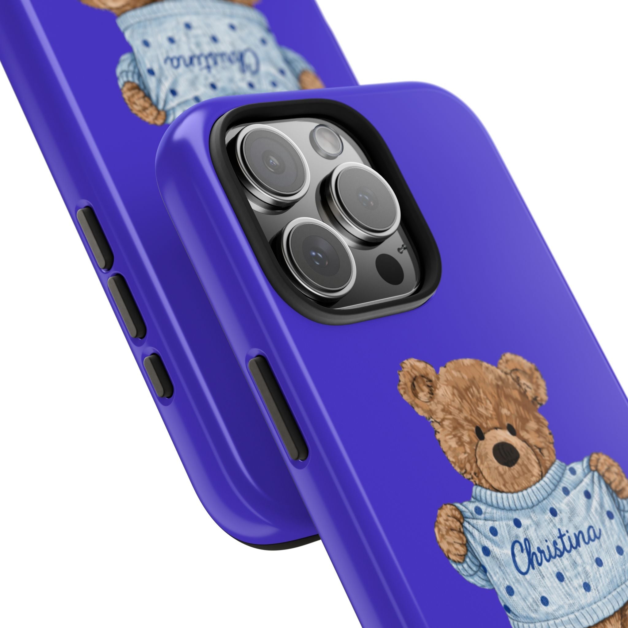 Blue phone case close-up: teddy bear sweater print and Christina near camera cutout