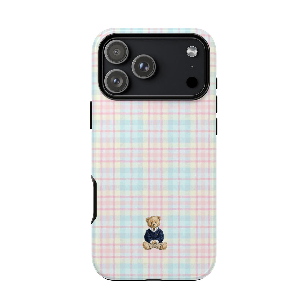 Pastel plaid phone case with small seated teddy bear graphic and camera module cutouts