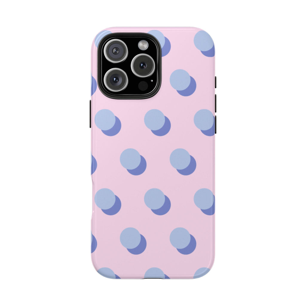 Pink phone case with blue polka dots pattern and visible camera lens openings