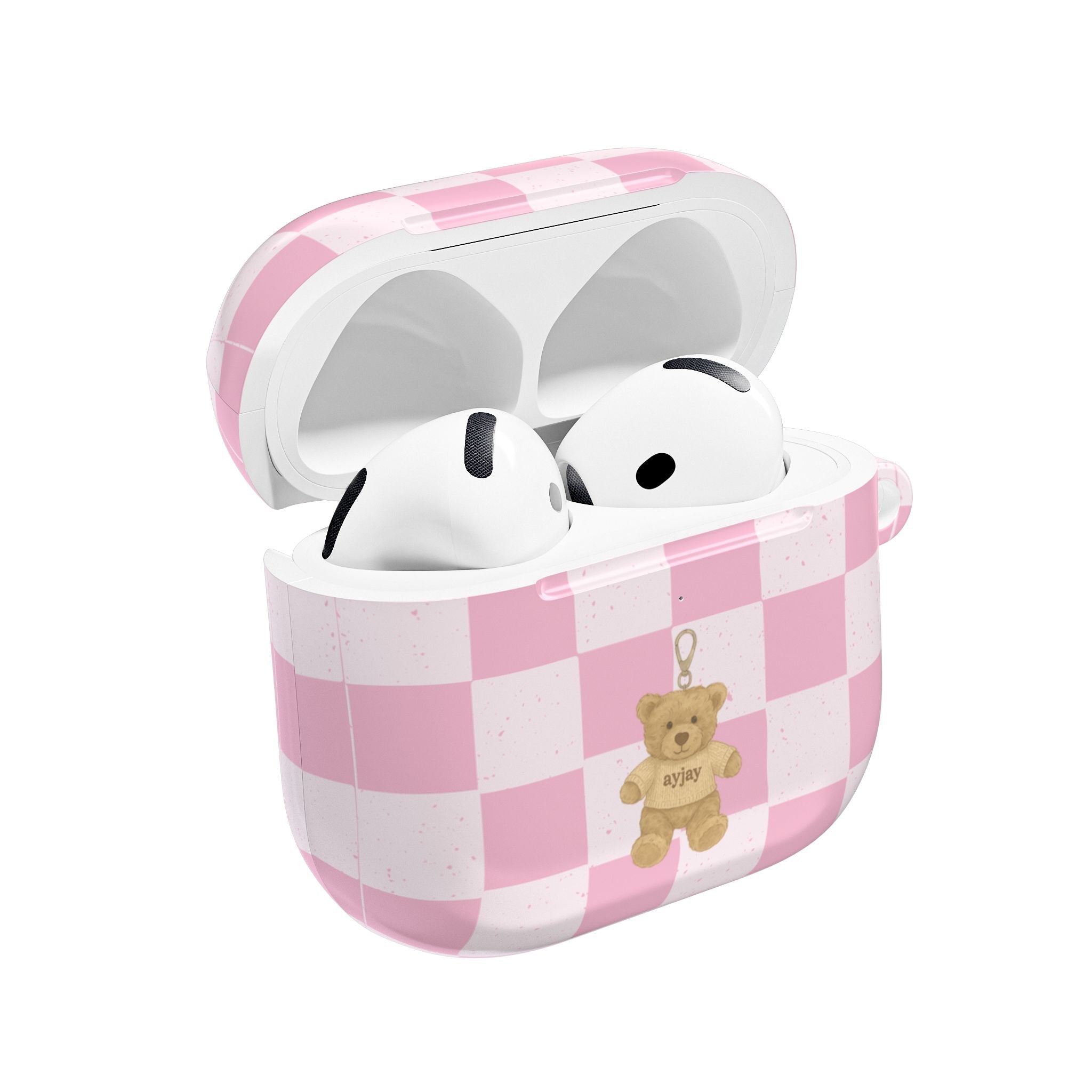 Pink checker teddy bear AirPods case with open lid and white earbuds inside