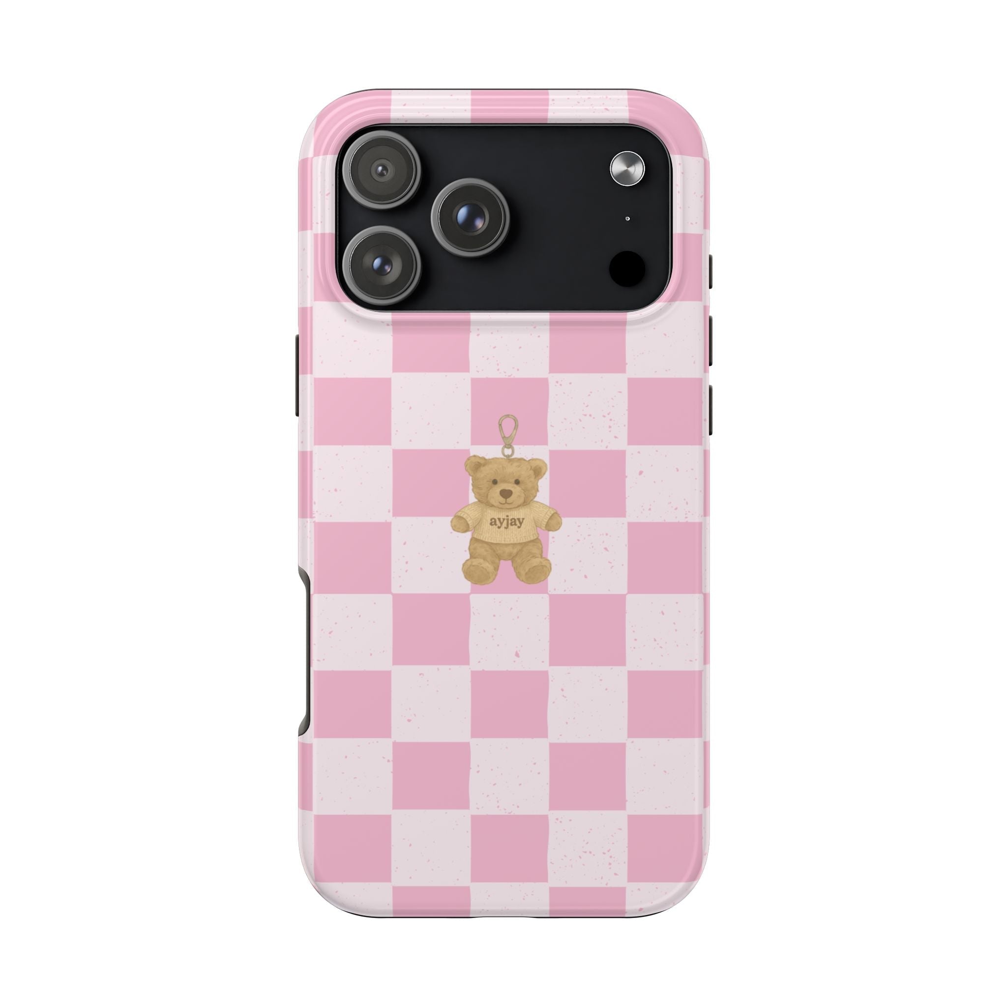 Pink checkered phone case with teddy bear keychain charm; camera and flash cutouts