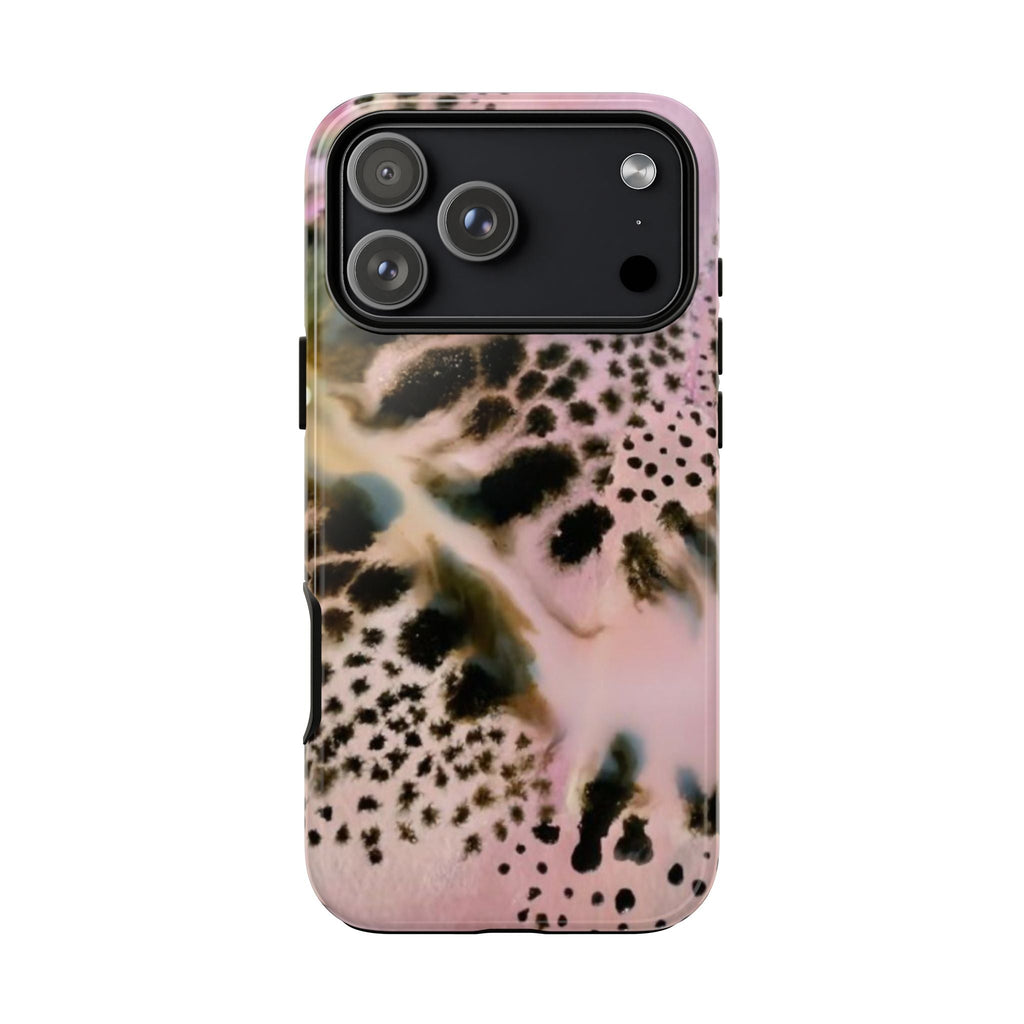 Pink cheetah print phone case with raised camera bezel and side openings