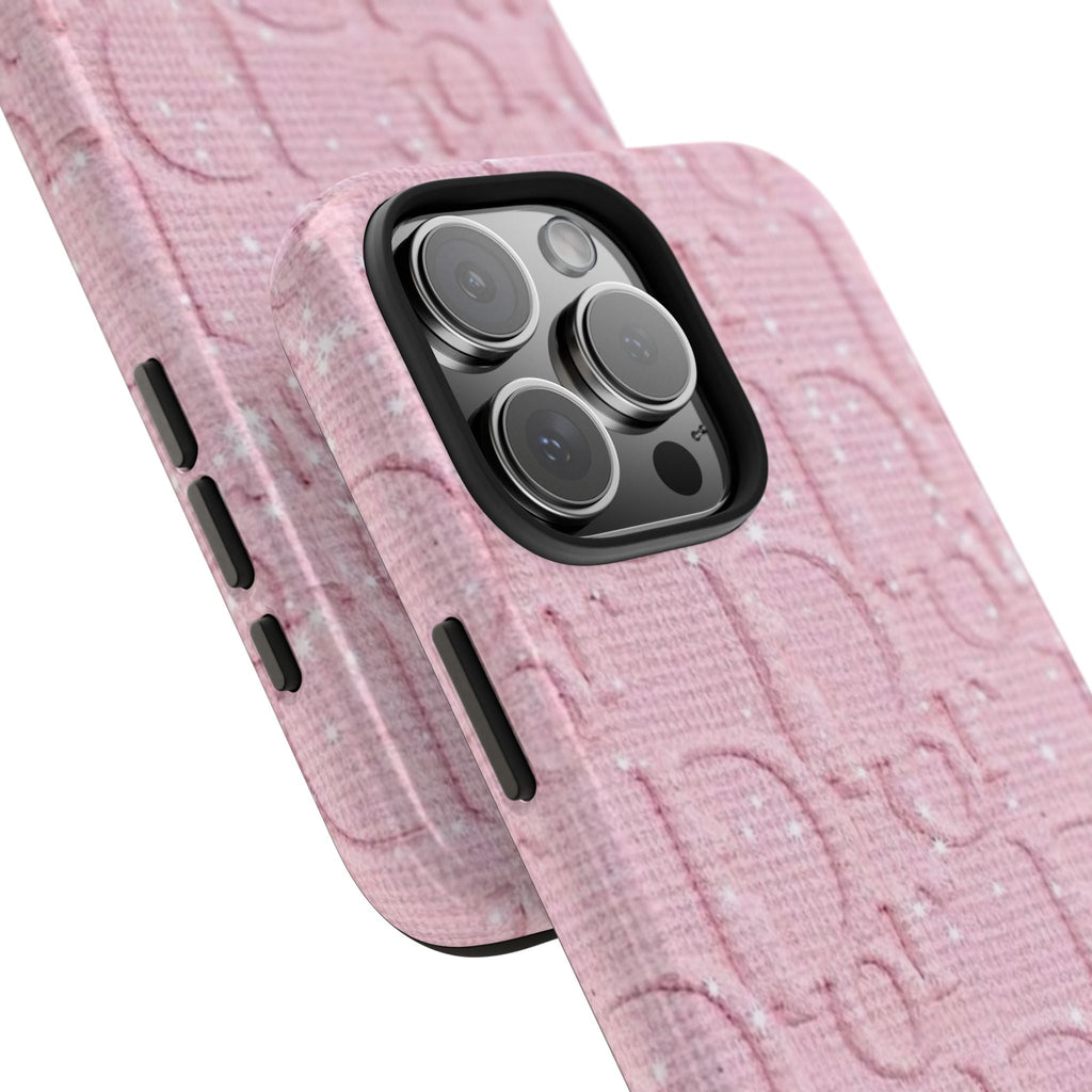 Pink Dior phone case angled view showing side button openings and camera lens cover