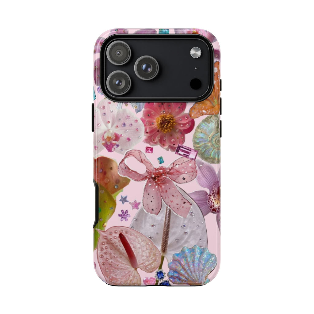 Pink floral phone case with bow and iridescent shells; smooth back with camera cutout