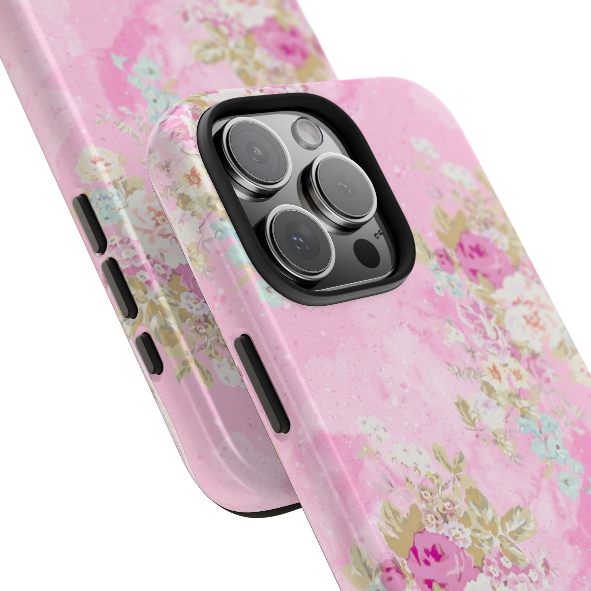 Pink floral phone case angled view, pastel blooms with side buttons and camera lens openings