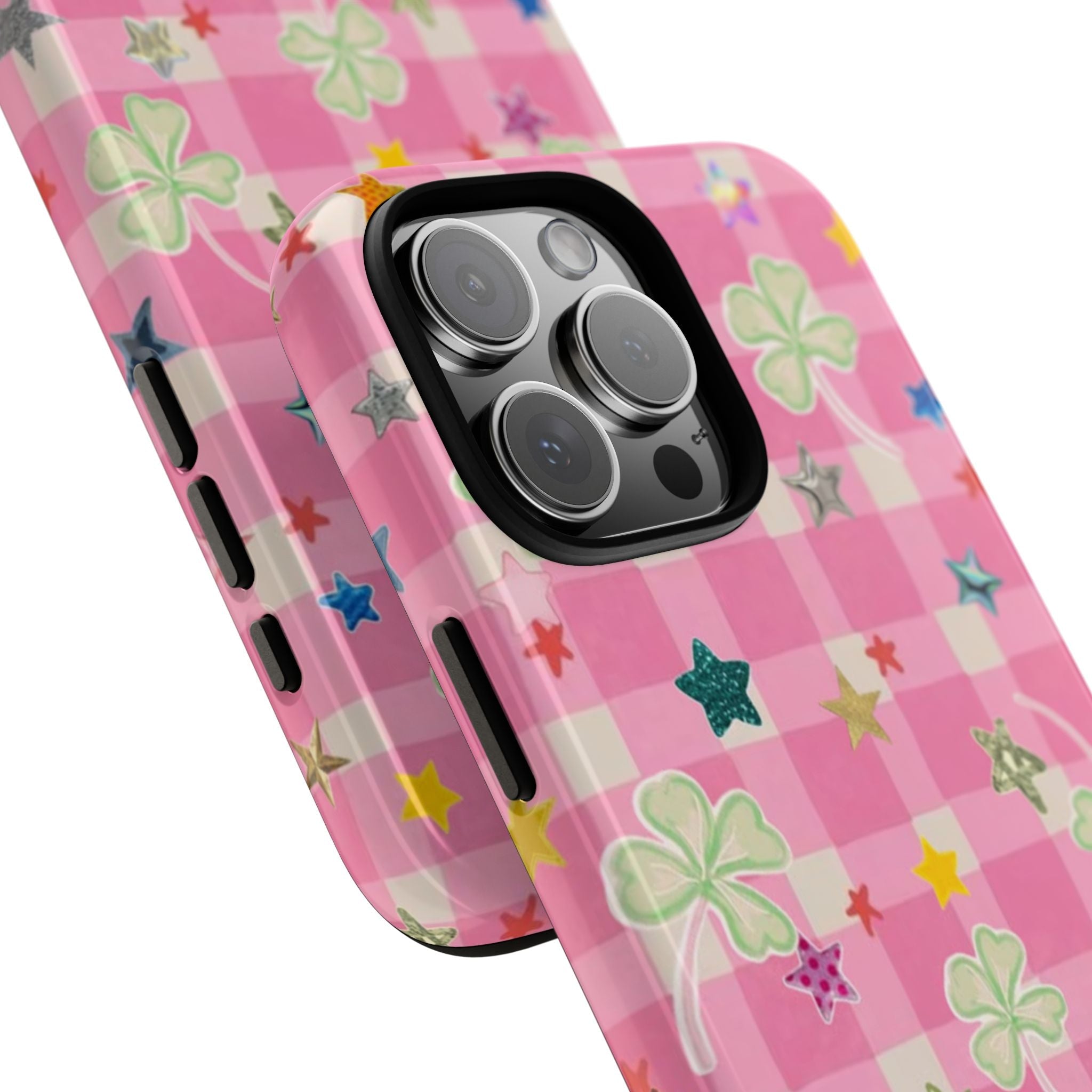 Angled pink gingham phone case showing clovers, stars, and lens protection bumper