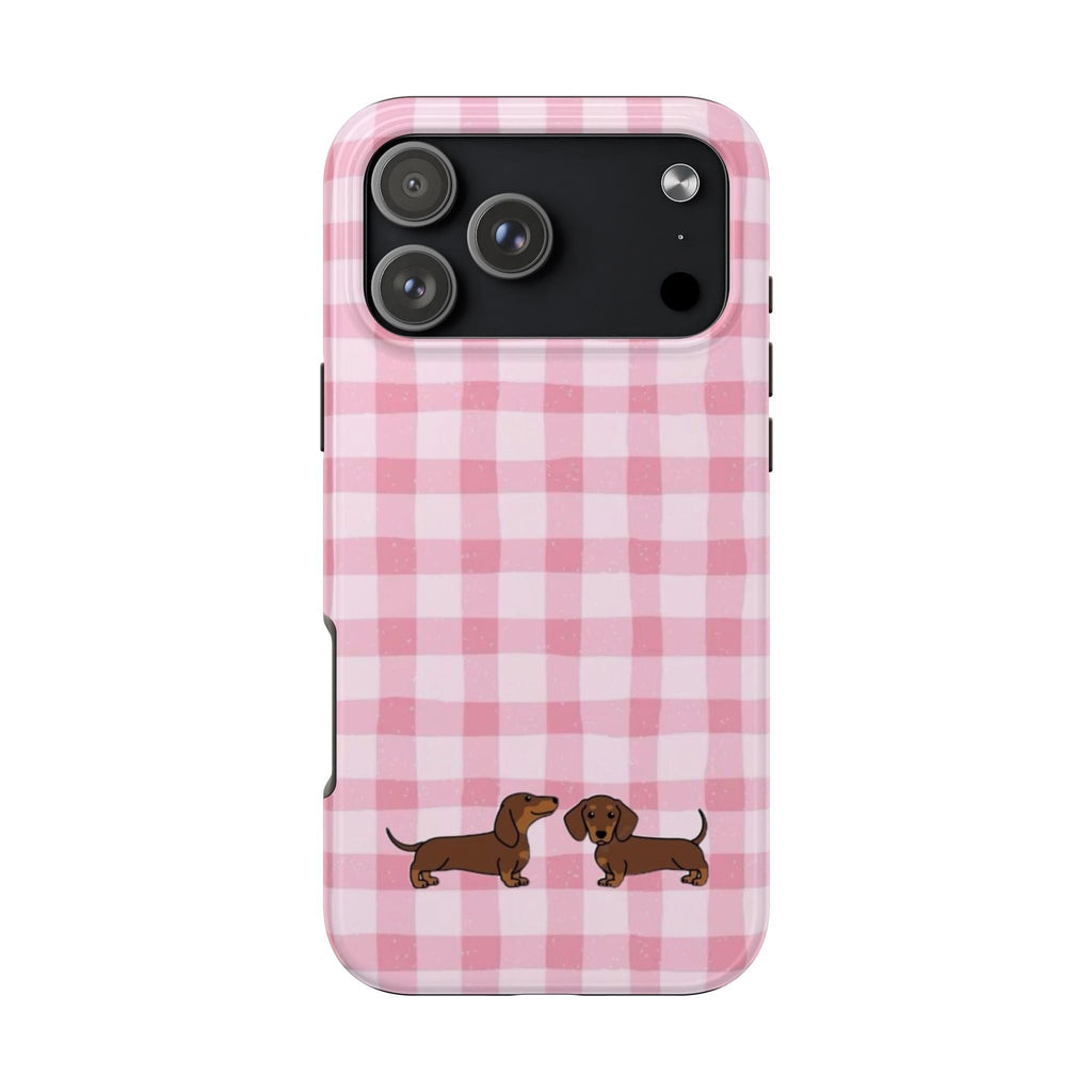 Back view of pink gingham phone case with dachshund puppy graphic and camera cutout