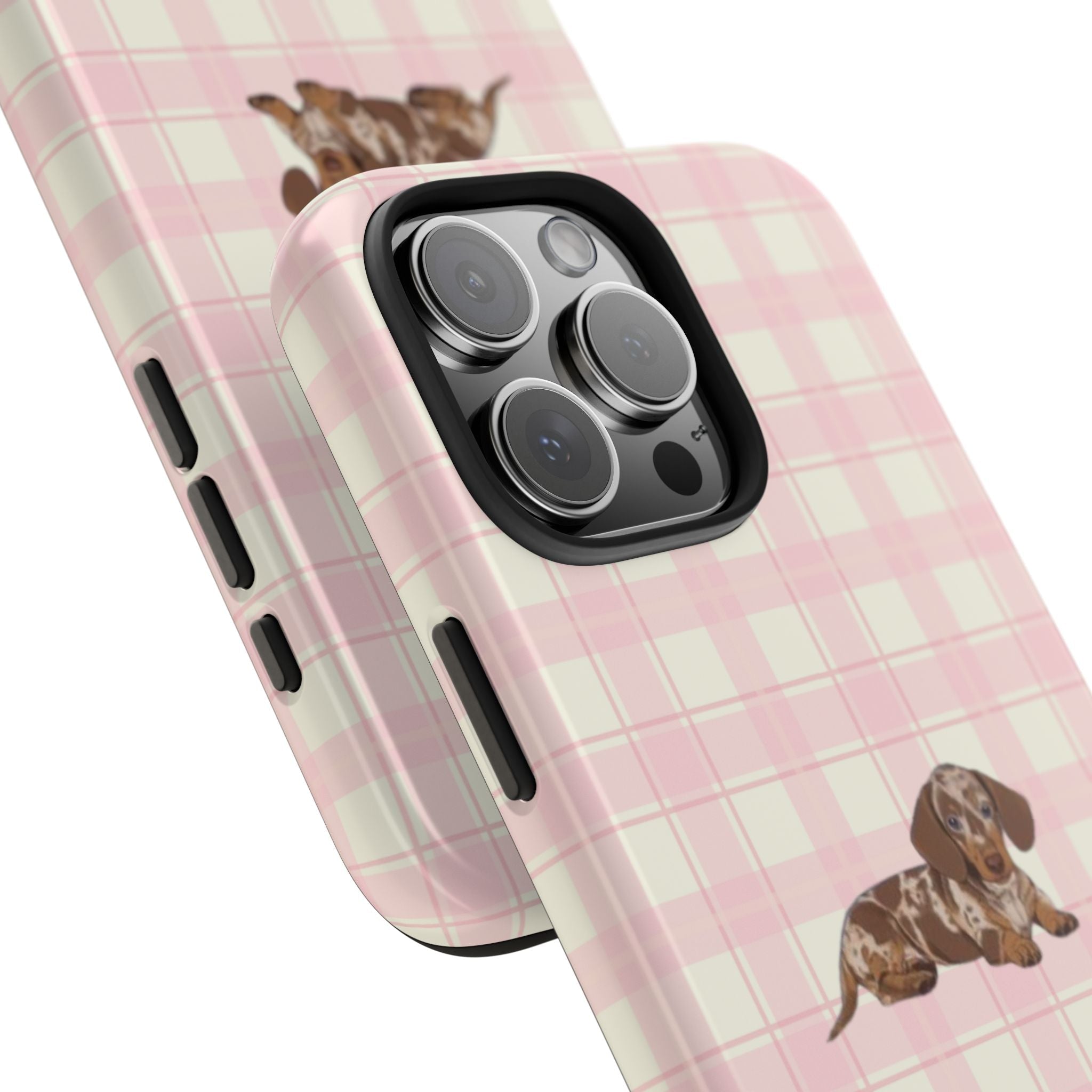 Pink gingham phone case with dachshund print, close-up of camera module and side cutouts