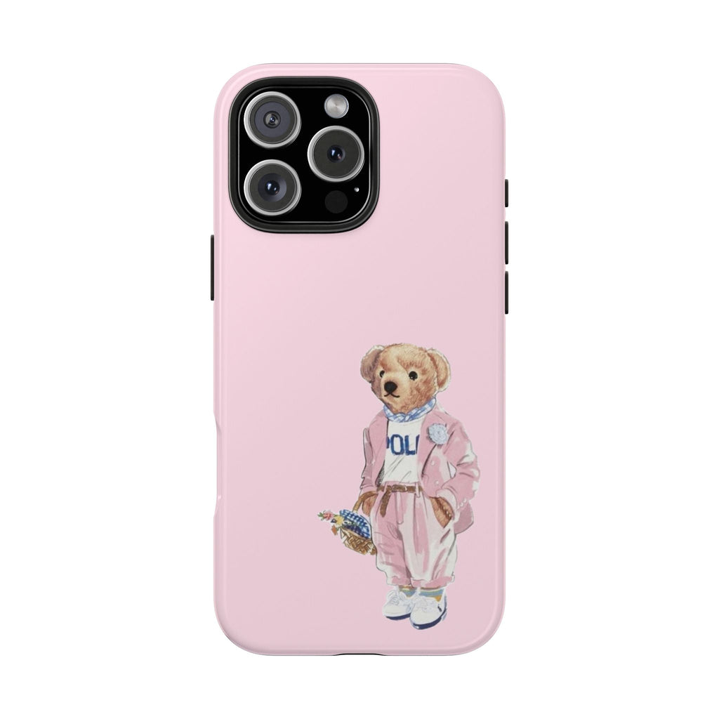 Pink phone case with teddy bear in polo outfit graphic on back, camera cutouts.