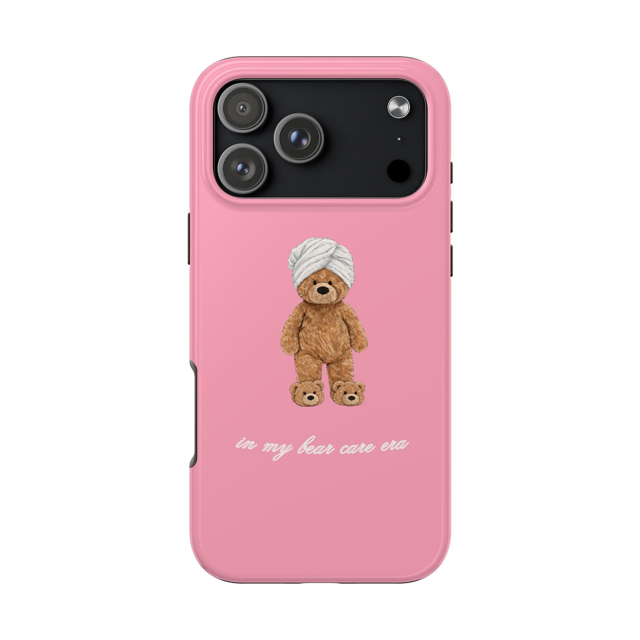 Pink phone case with teddy bear graphic, camera opening, and in-my-bear-care-era text