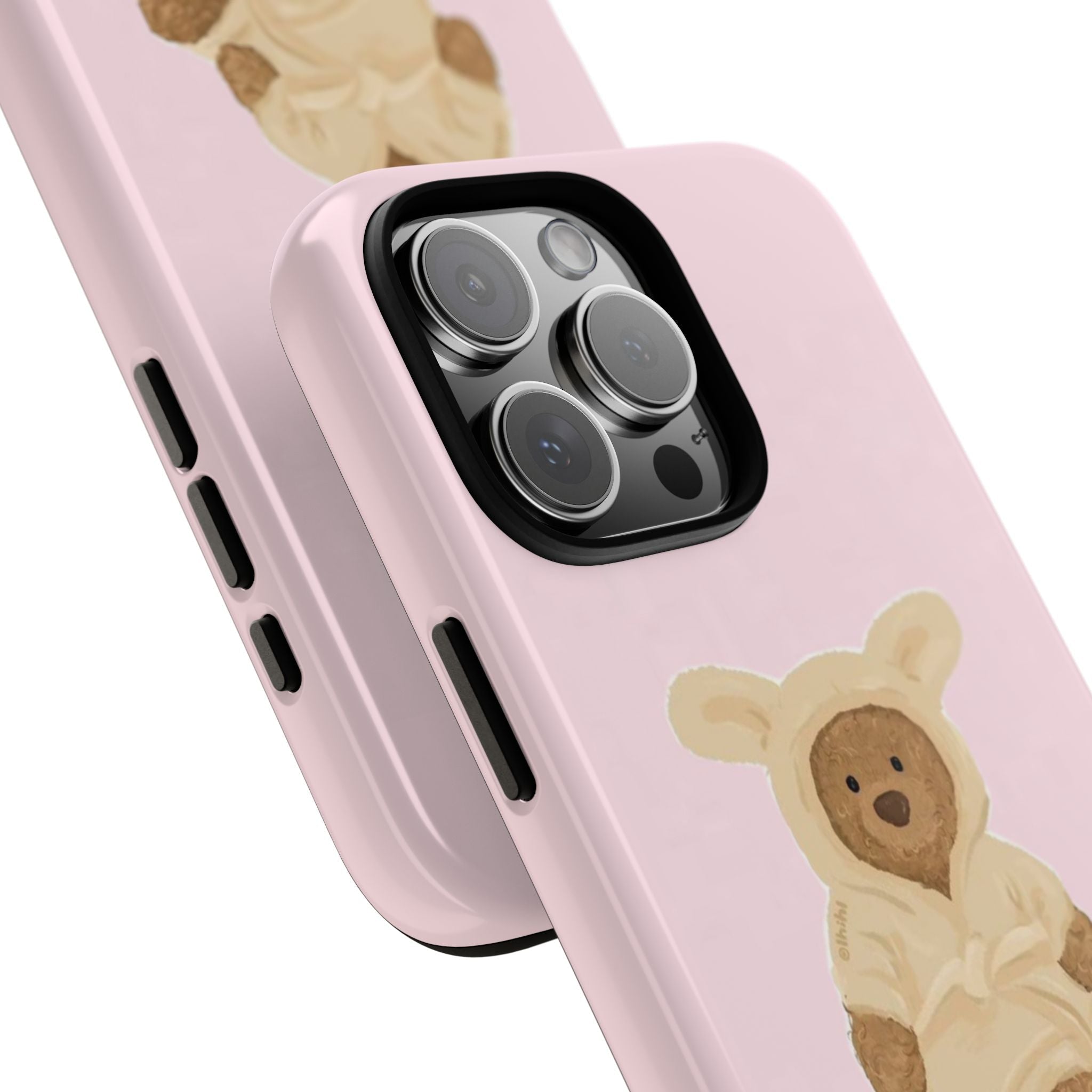 Pink teddy bear robe phone case, angled view showing camera lenses and side buttons