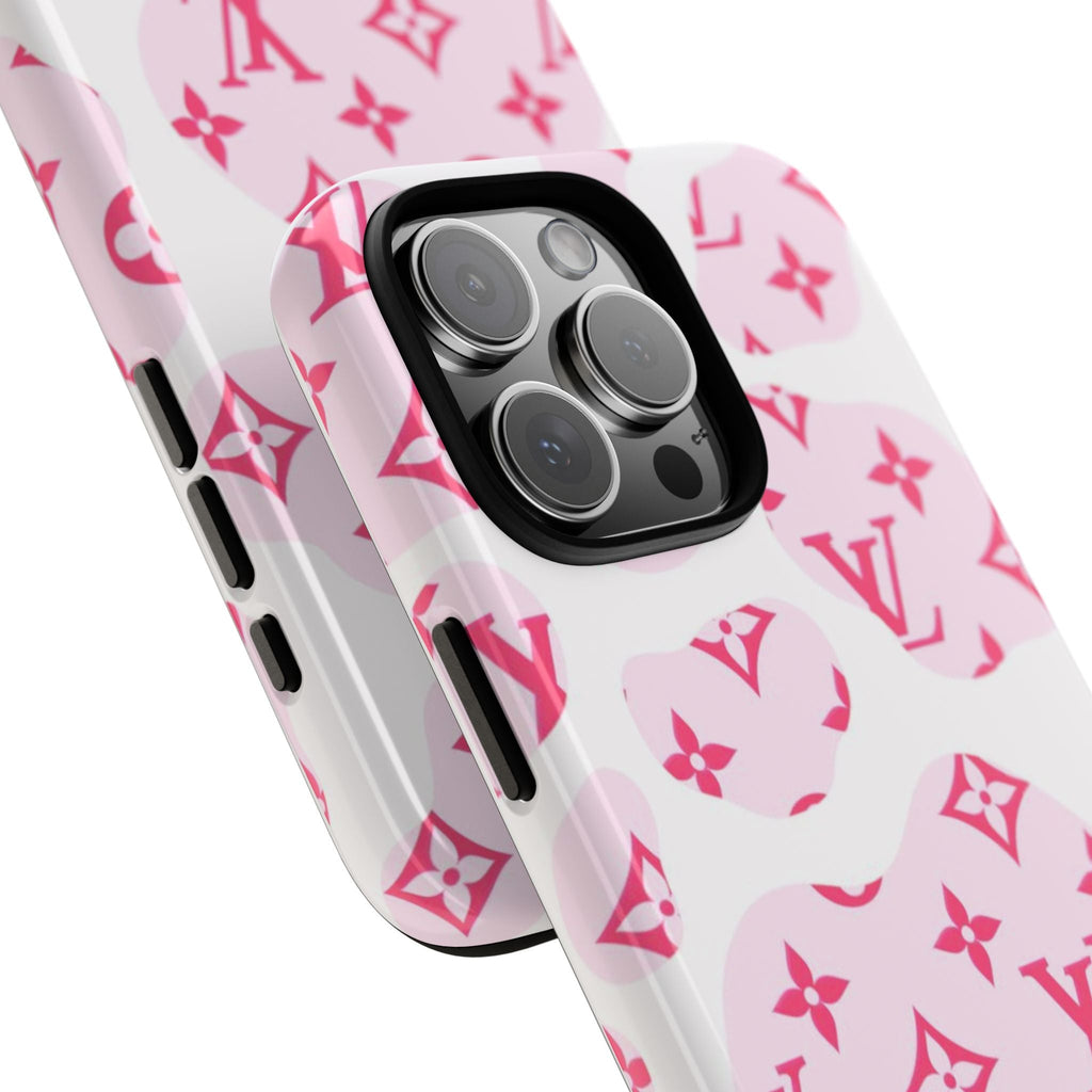 Pink cow print phone case showing camera lenses and side button cutouts