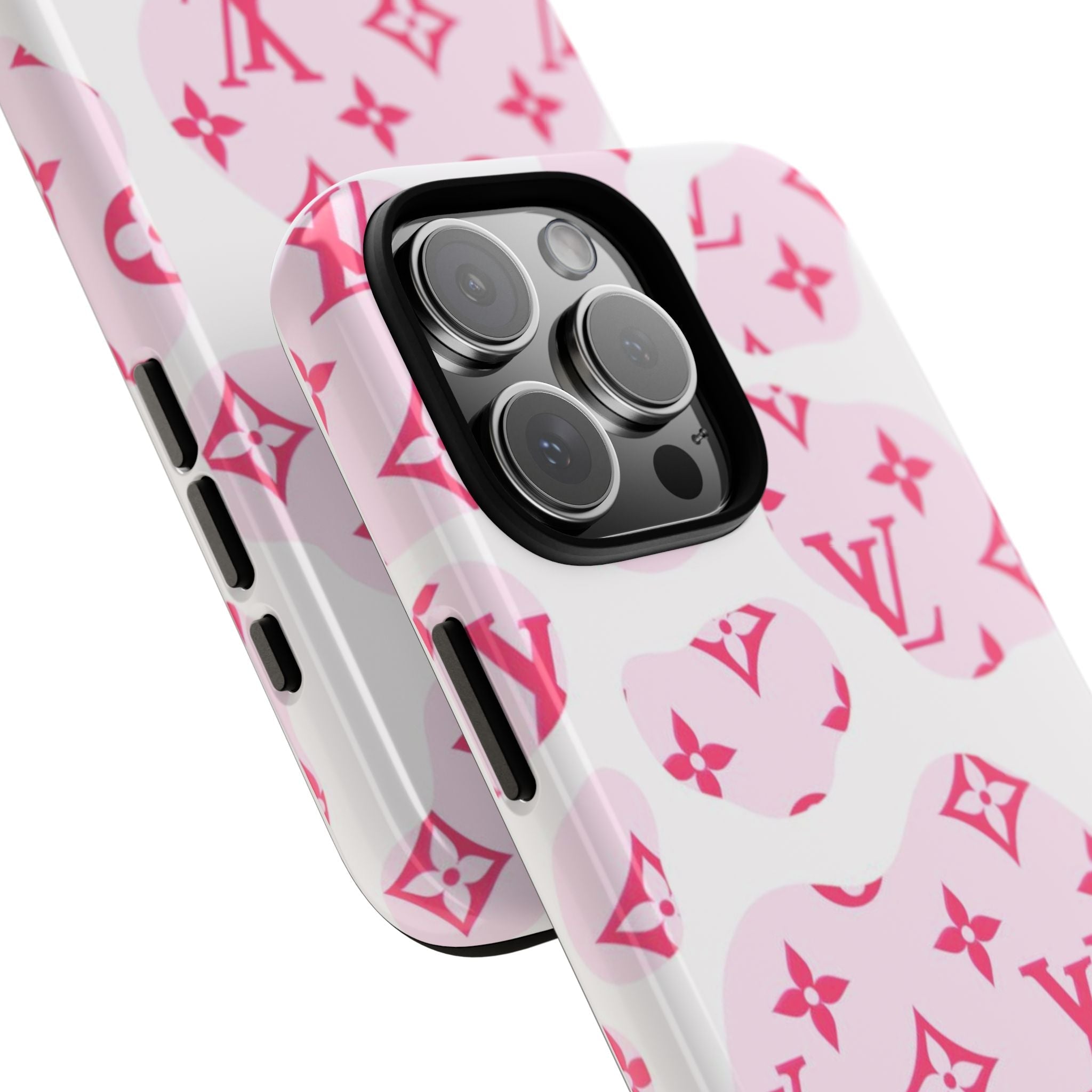 Pink cow print phone case showing camera lenses and side button cutouts