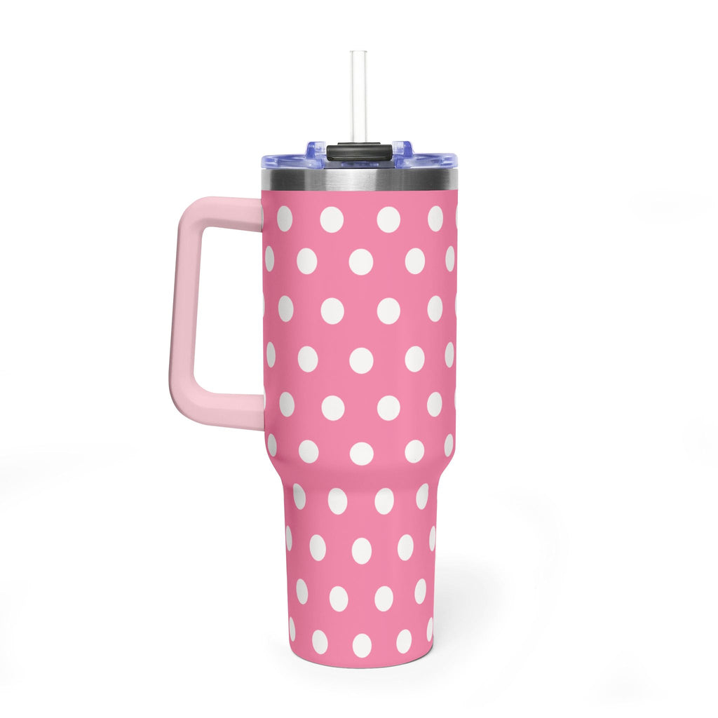 Pink 40oz stainless tumbler with white polka dots, side handle, clear lid and straw