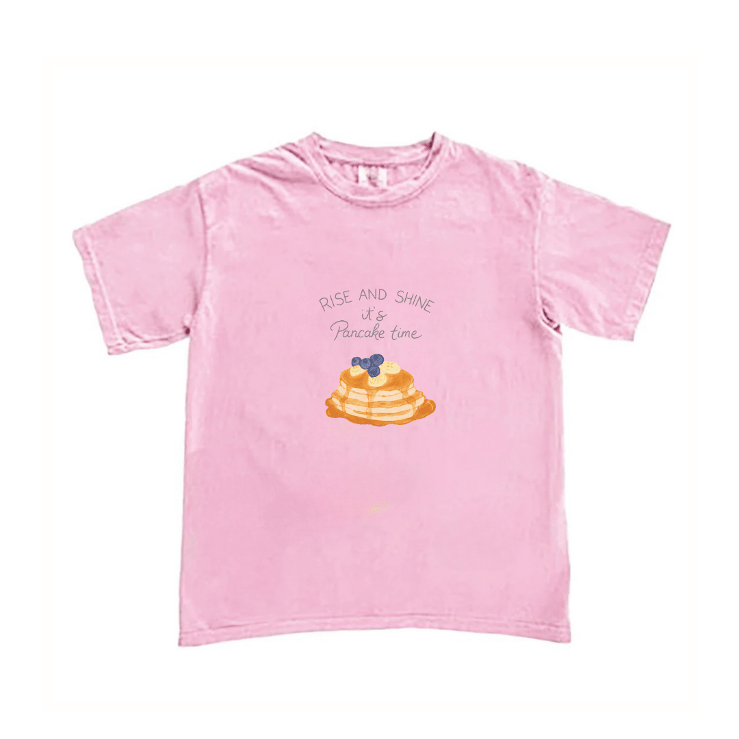 Pink T-shirt, front print of pancakes with 'Rise and Shine' text.