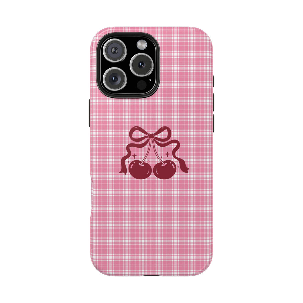 Pink plaid phone case with cherry bow graphic and camera cutout